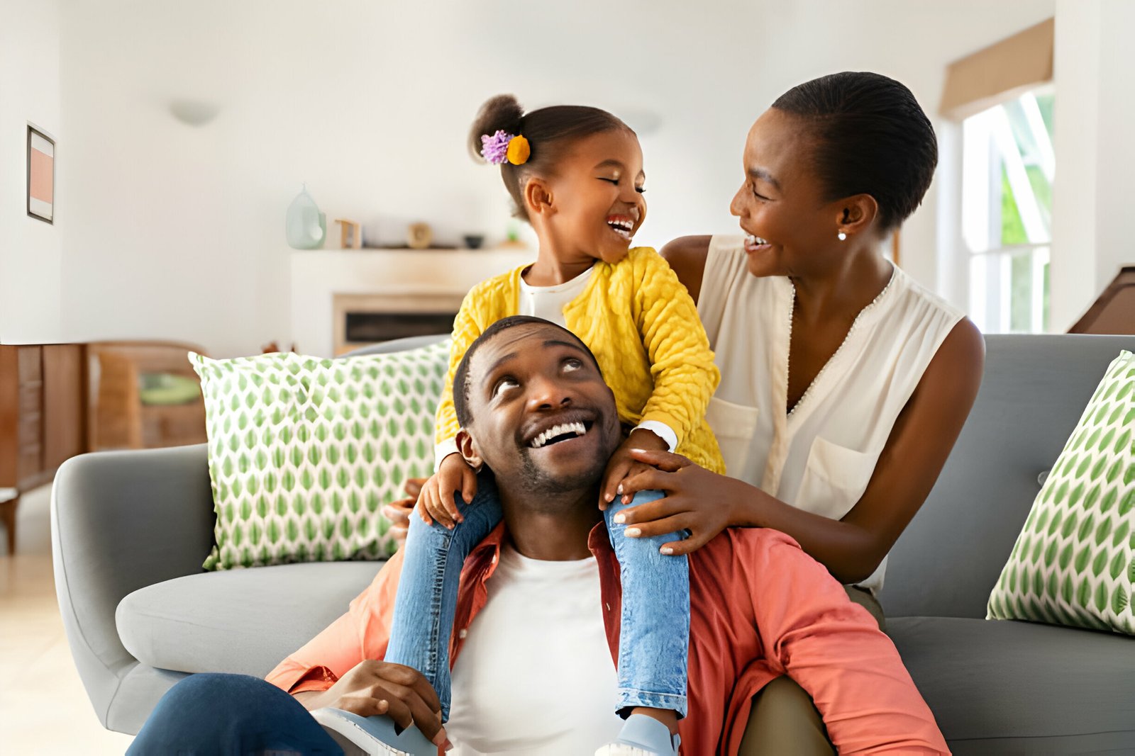 Black man with wife and child